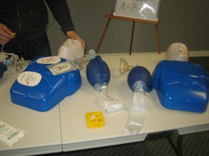 Adult training mannequin, AED pads, and bag valve masks